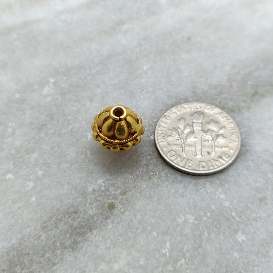 Solid 18K gold spacer ball bead used in luxury bracelet and necklace designs