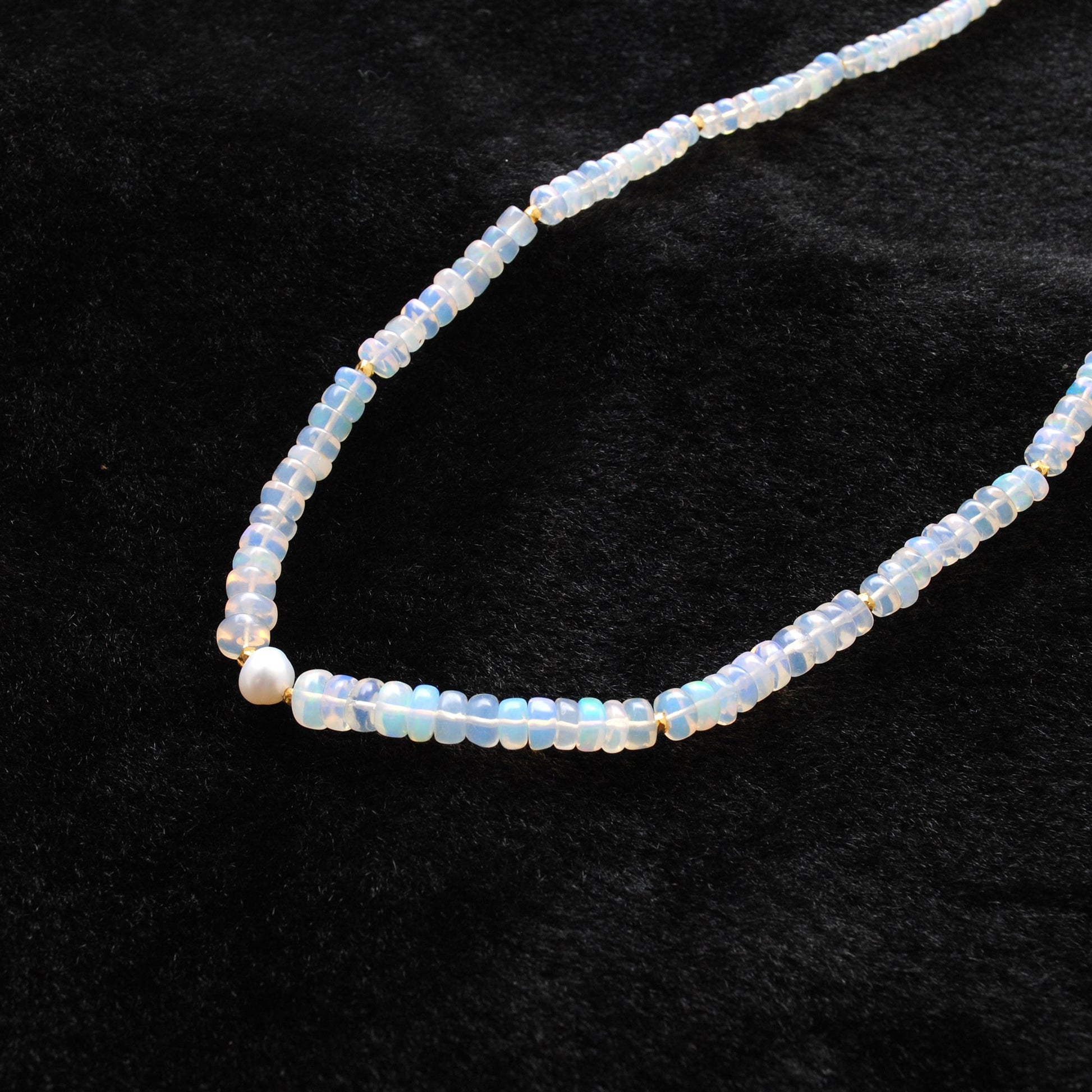 925 Sterling Silver Opal & Freshwater Pearl Beaded Necklace showcased on a dark background.