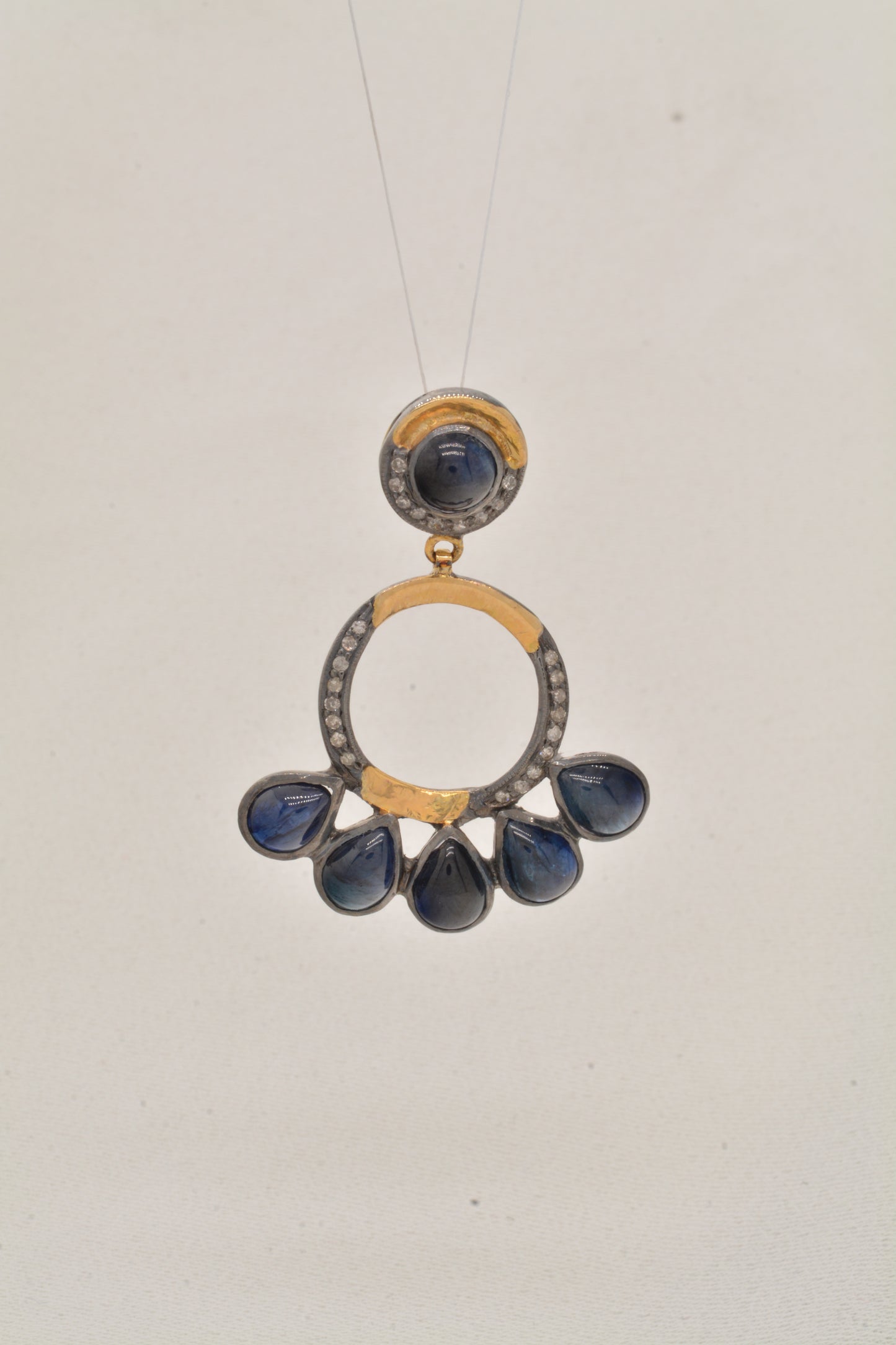 Radiant Handcrafted Blue Sapphire and CZ Drop Silver Earrings