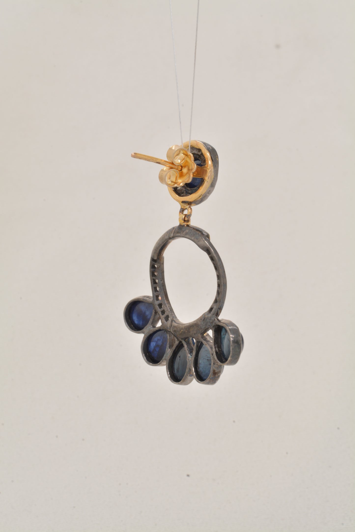 Radiant Handcrafted Blue Sapphire and CZ Drop Silver Earrings