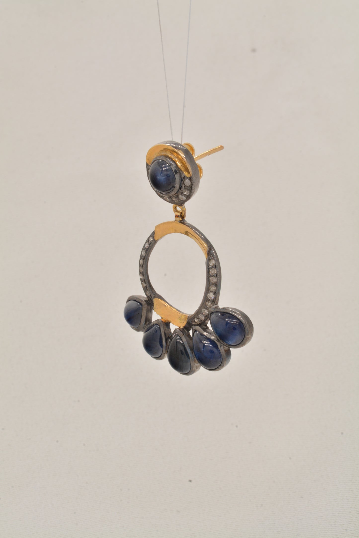 Radiant Handcrafted Blue Sapphire and CZ Drop Silver Earrings