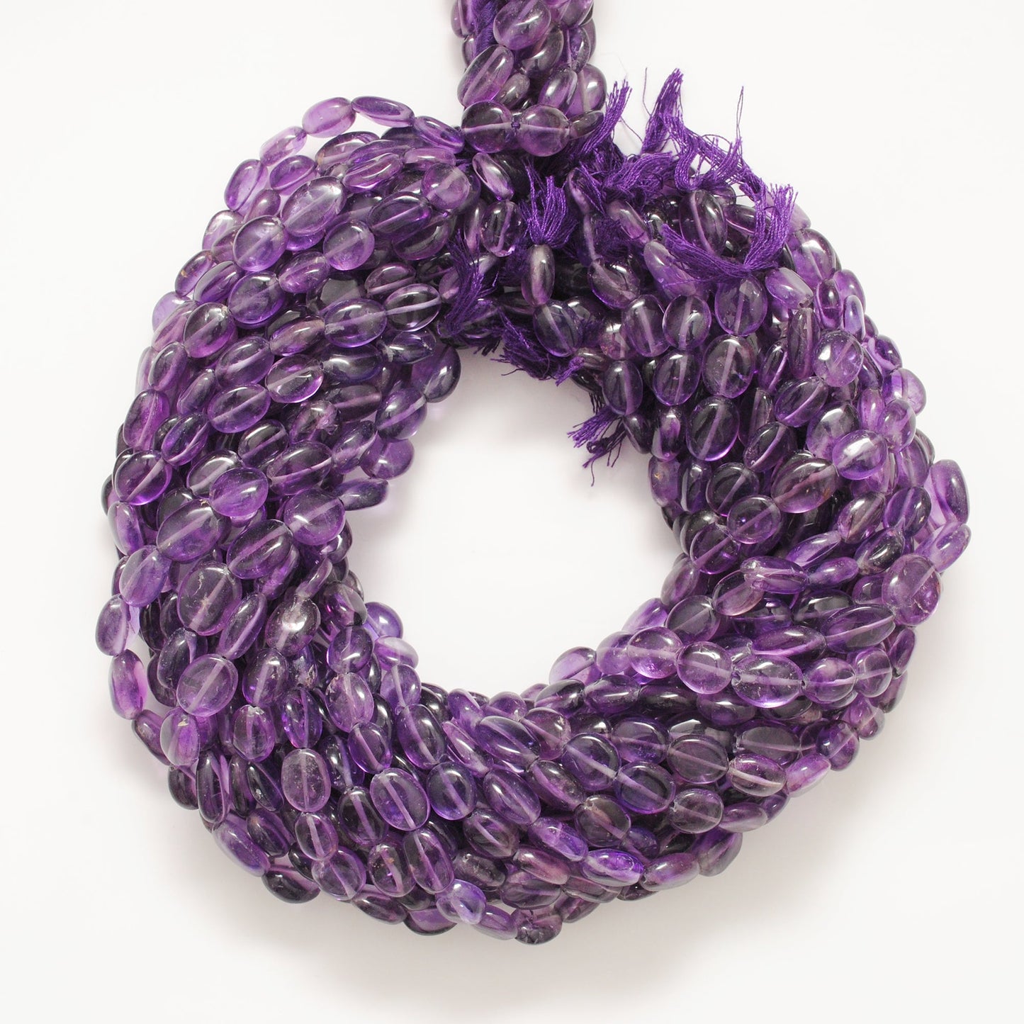 Natural Amethyst Oval Gemstone Beads – 5x10-9x13mm Mixed Sizes – 15" Strand (41 Stones)